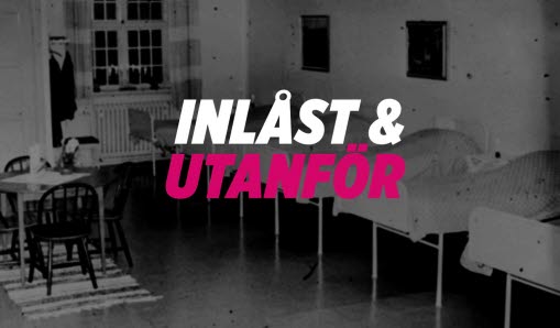 Svart-vit bild av sängar längs en vägg i ett institutionsrum