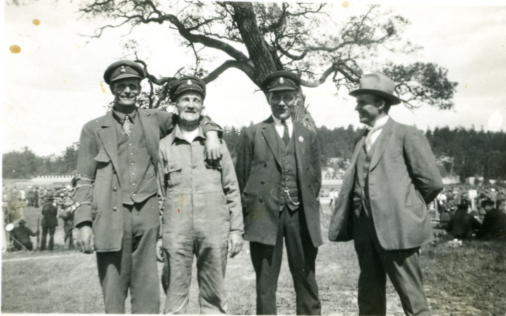 Skyttetävling vid Stora Skuggan på Norra Djurgården i Stockholm. Från vänster Gustav Gustavsson, ägare till Björkby gård, Carl Bornholm, okänd, okänd. (Bilden är tagen före 1931 eftersom Carl Bornholm dog det året.)

Inom området Stora Skuggan, fanns skjutbanorna för Stockholms Stads frivilliga skarpskytteförening. Banorna användes för skytte vid Olympiaden 1912. Från den tiden är en gråstensmur bevarad, som är den tidigare 600-metersvallen för skyttebanan vid Stora Skuggan. År 1978 lades verksamheten ner, men dåvarande K1 nyttjade skjutbanorna ett antal år in på 1980-talet. Området ingår sedan 1995 i Nationalstadsparken.